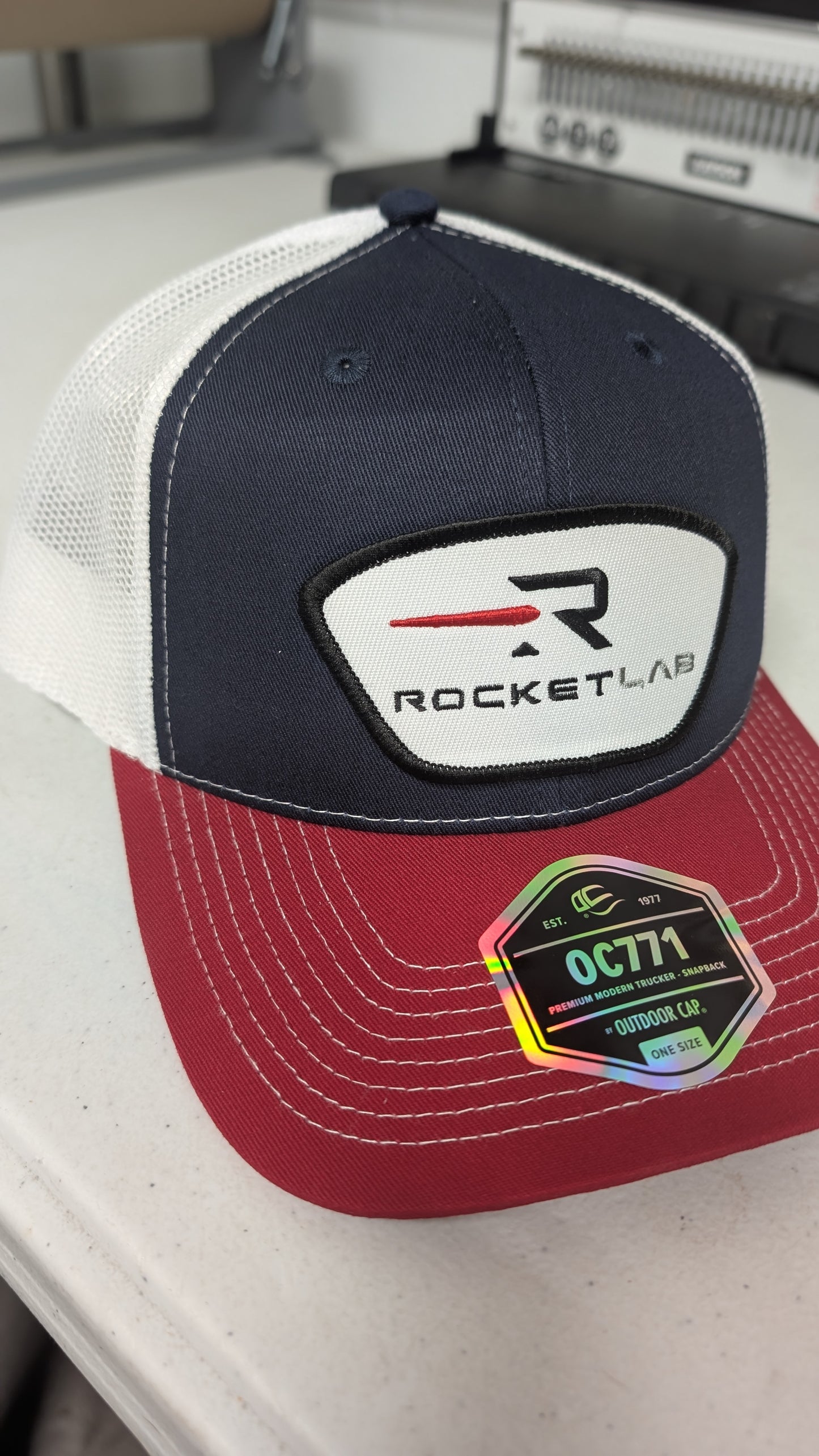 RocketLab Snapback NAVY with White Mesh. RED Bill